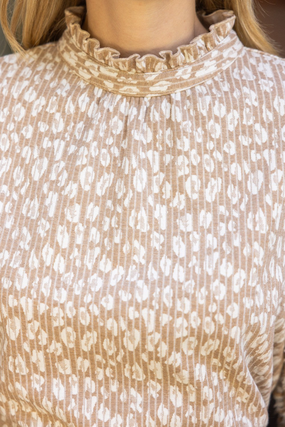 Tell Me About It Top